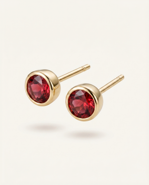 Aris birthstone stud earrings gold garnet