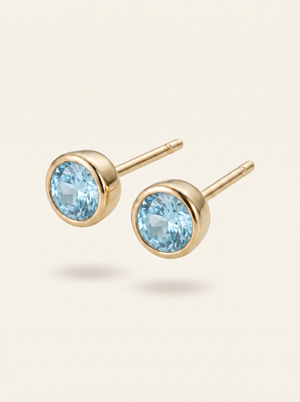 Aris birthstone stud earrings gold light blue