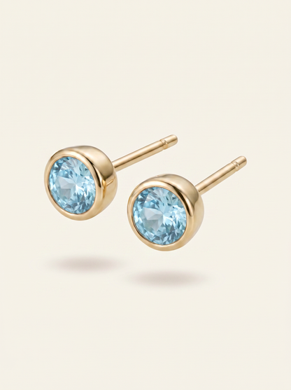 Aris birthstone stud earrings gold light blue