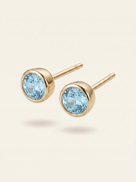 Aris birthstone stud earrings gold light blue